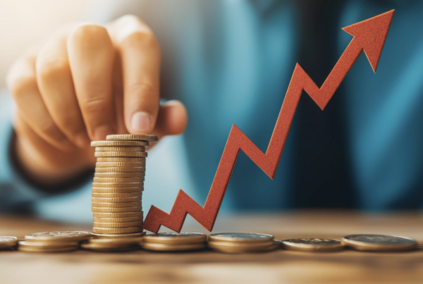 person stacking coins