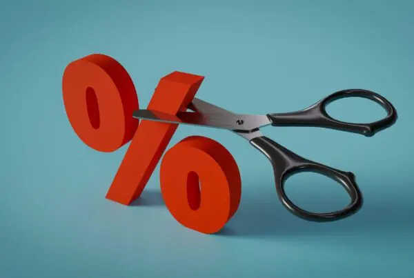 scissors cutting a percentage sign