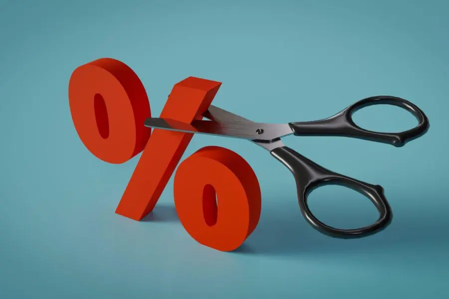 scissors cutting a percentage sign