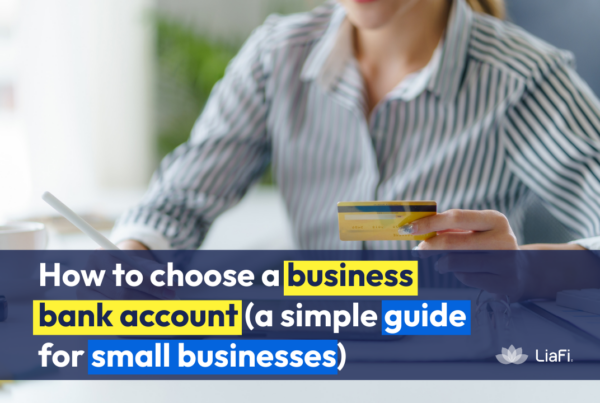 how to choose a business bank account illustrated by a small business owner reviewing payments and managing finances