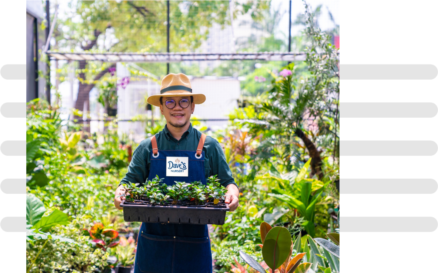 man holding plants