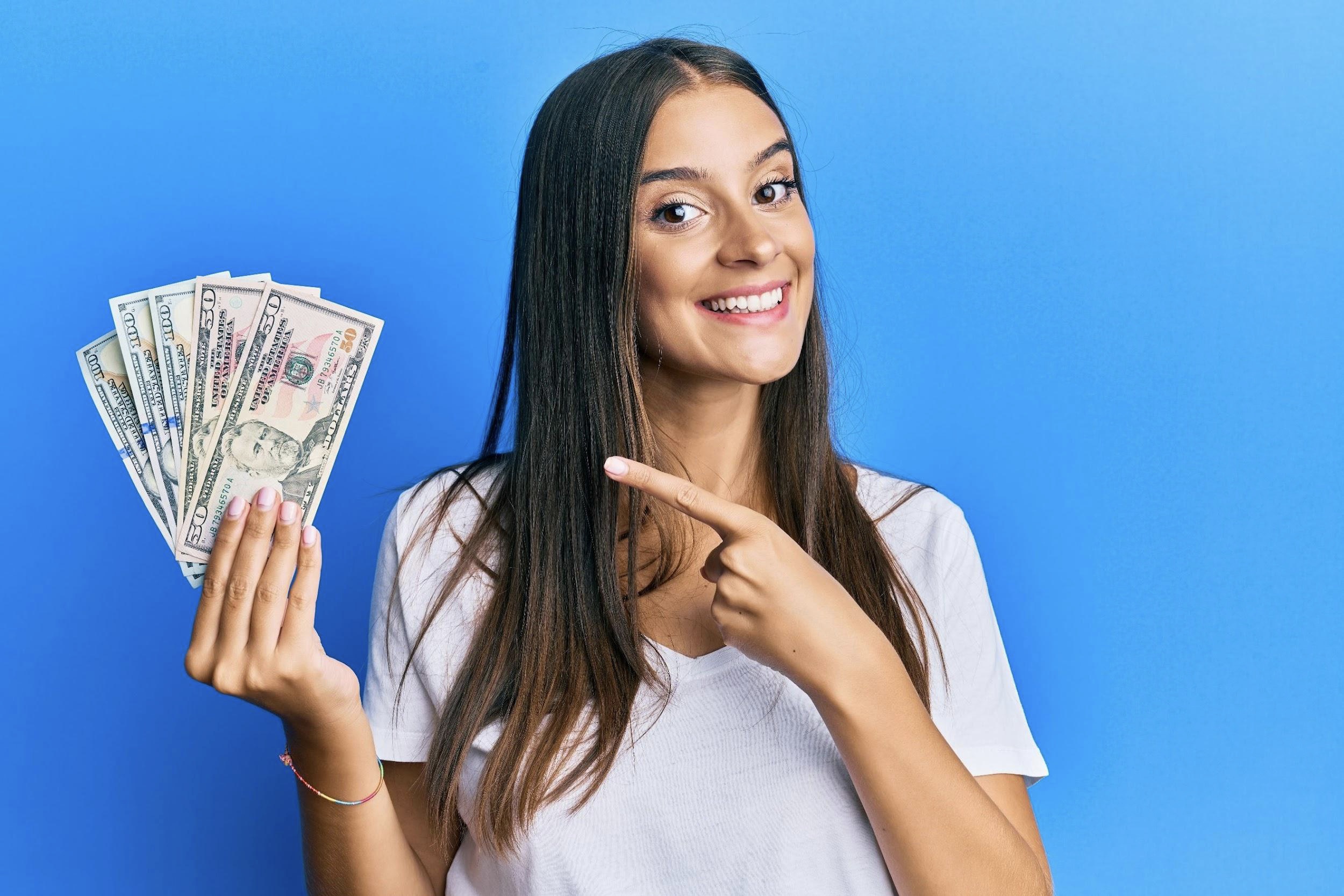 woman holding money
